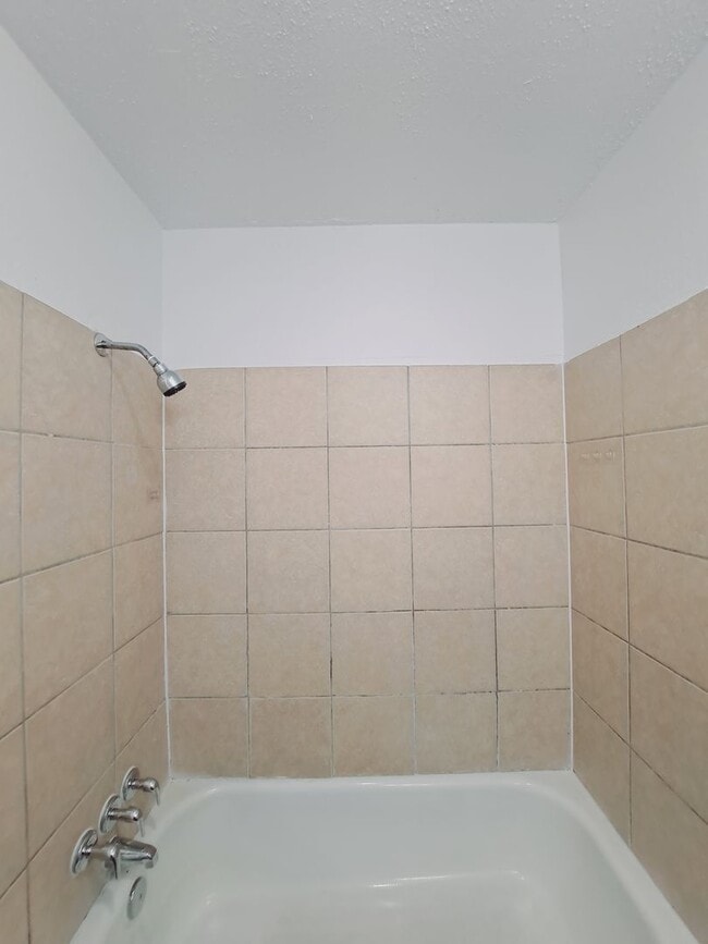 Building Photo - Amazing 3/2 with Garage Conversion Ready For Move In