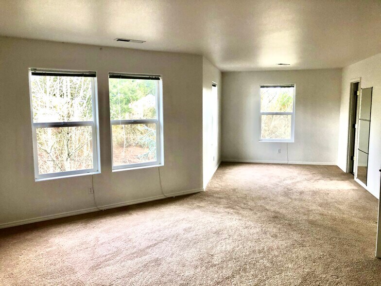 Primary room - Huge with sitting area and views - 1552 SE Ripplewood Ave