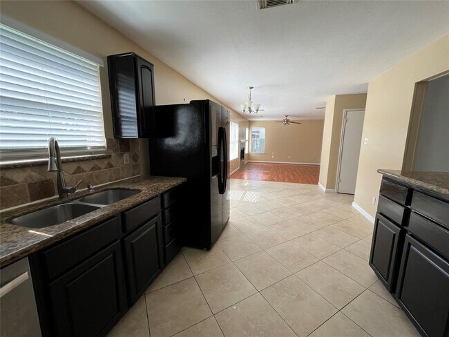 Building Photo - 8411 Tamayo Dr