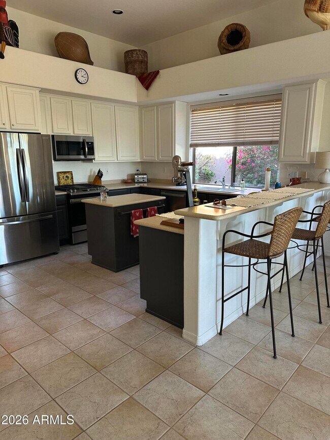 Building Photo - 9255 E Broken Arrow Dr