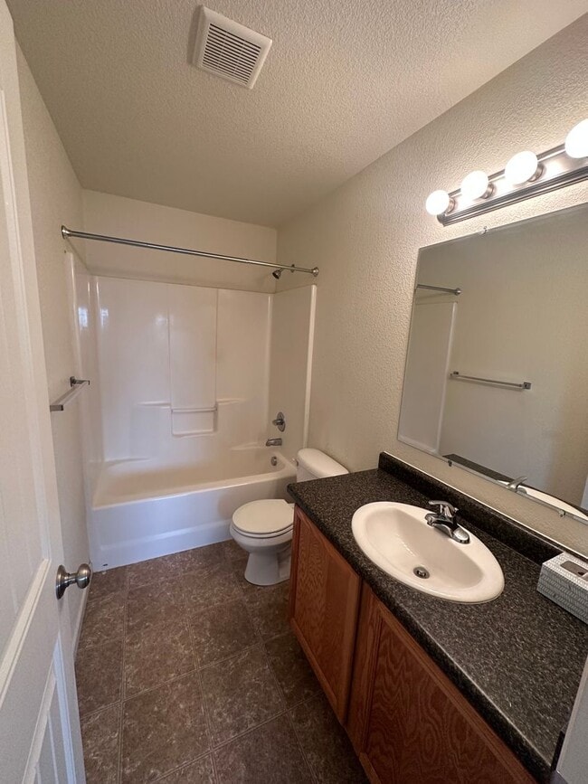 Building Photo - 3 BEDROOM, 2.5 BATHROOM TWINHOME WITH 2 CAR ATTACHED GARAGE