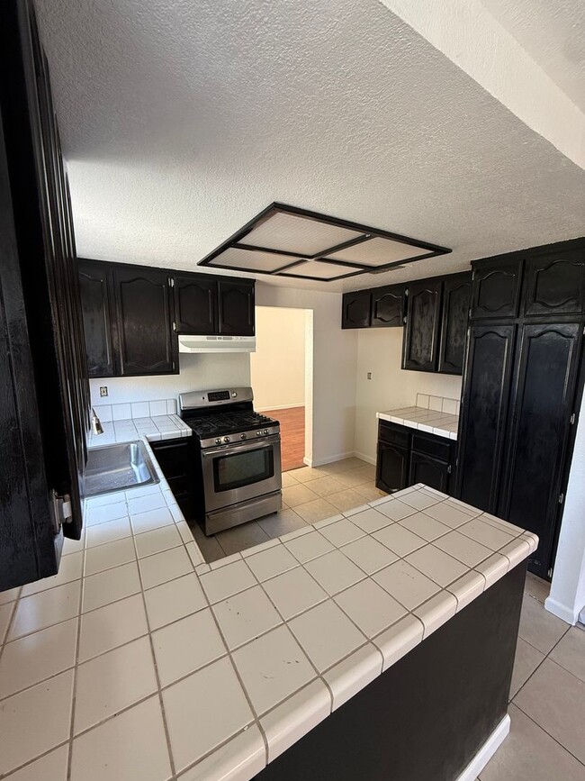 Building Photo - 4 bed | 2.5 bath | 1712 SF | 2 Car Garage | Two Story | Tenant pays $175 monthly for WS&G