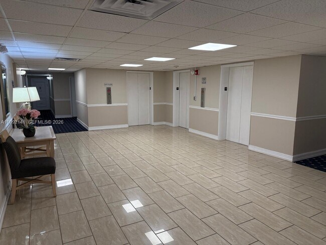 Building Photo - 5005 Collins Ave