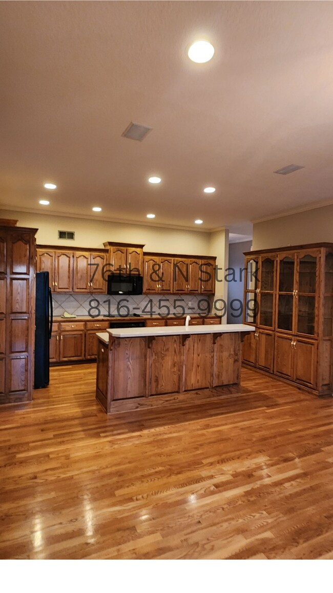 Kitchen with an expansive layout, perfect for culinary creations and family gatherings. - 6003 N Norton Ave