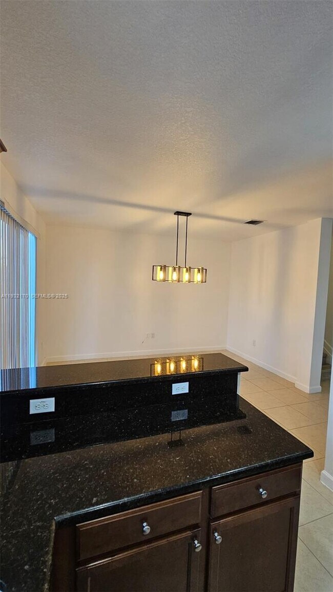 Building Photo - 8785 NW 116th Ct