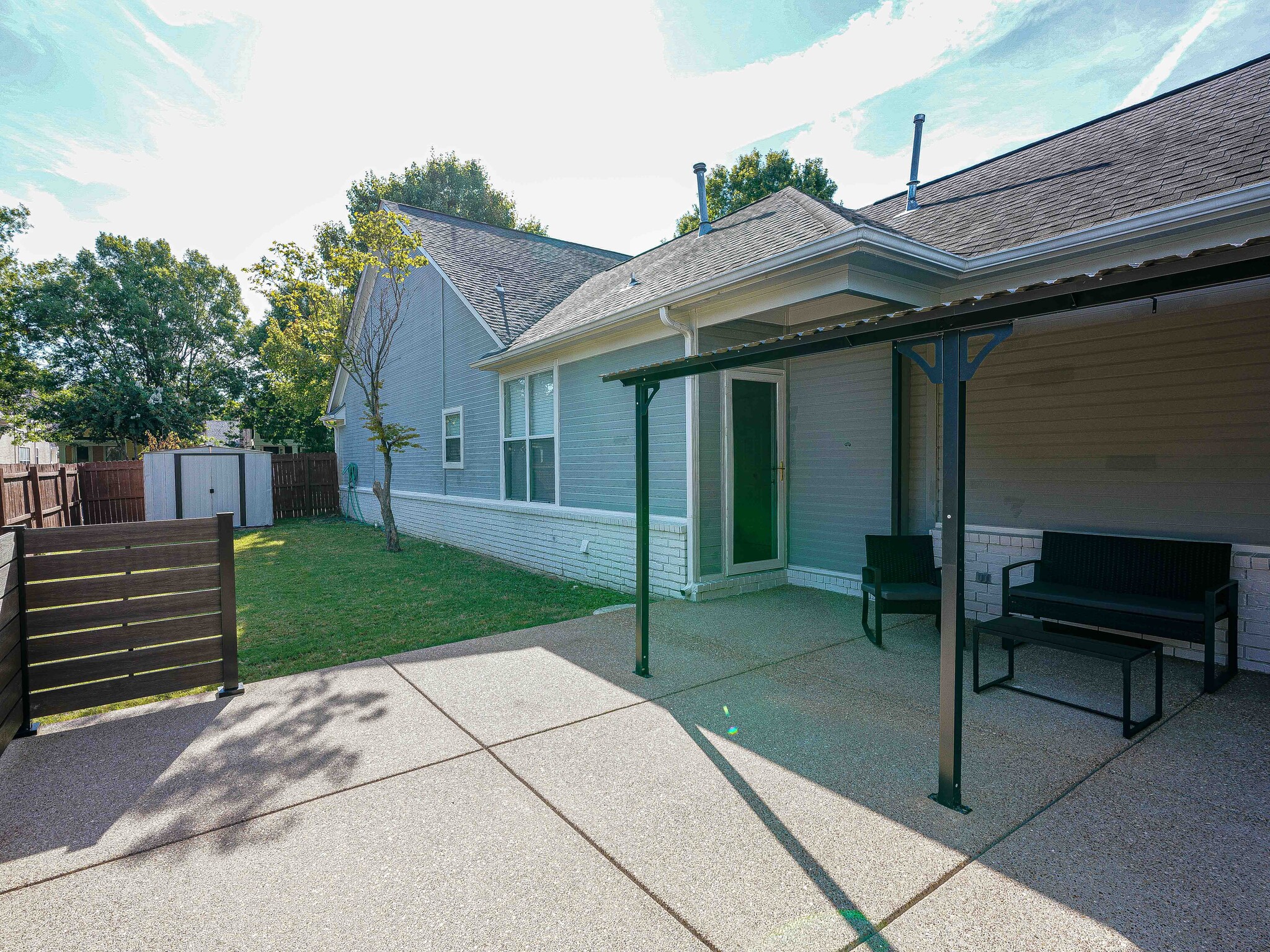 Backyard Patio w Pergola - 1229 Misty Isle Dr