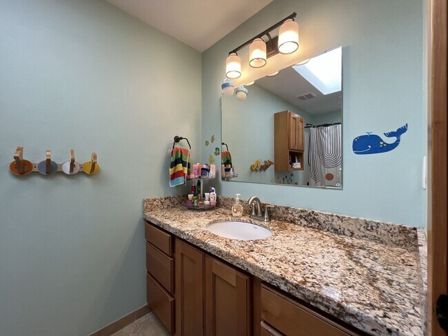 Building Photo - Bright and Open 4 Bedroom Cedar Mill Home with Vaulted Ceilings, Skylights & Multiple Living Areas