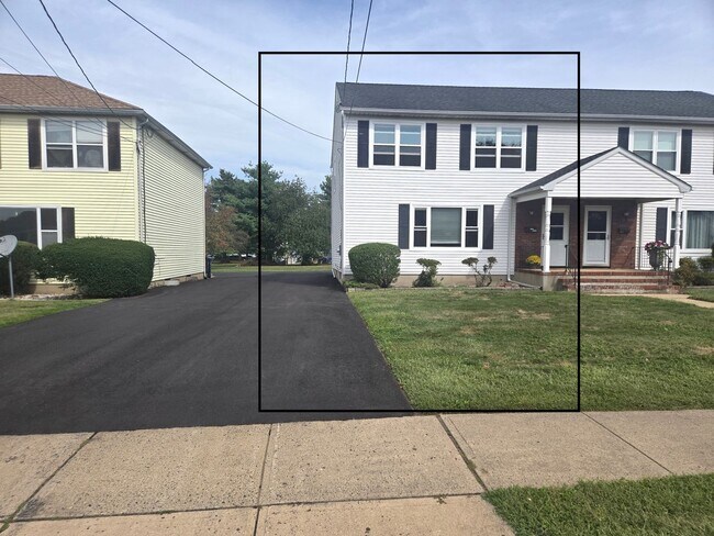 Building Photo - Updates abound at this SPACIOUS, half duplex with 3+ off-street parking spots, 3-bedrooms and 2 f...