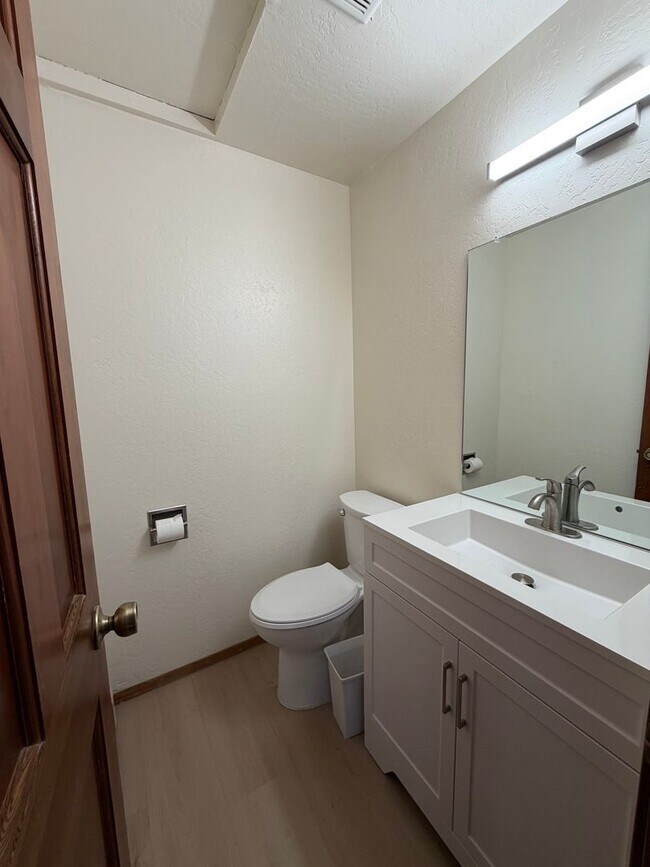 Building Photo - 2 Bed + Huge Bonus Room -  new flooring, paint and kitchen!   Lake Village Condo w/Forest Views