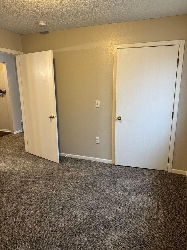 Building Photo - Whispering Pines