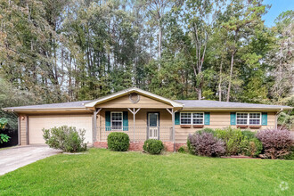 Building Photo - Bright Interiors & Spacious Backyard