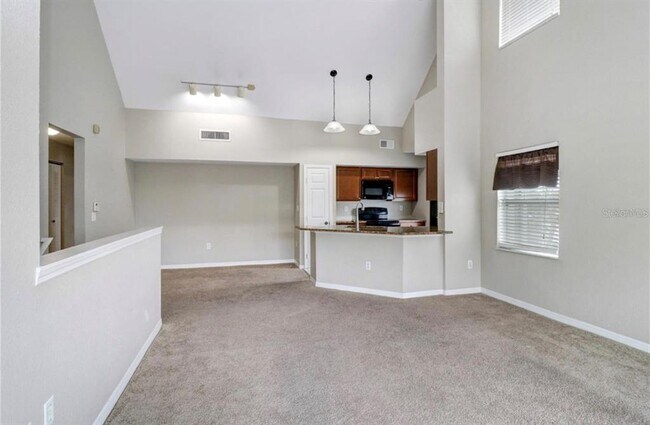 Building Photo - 9506 Lake Chase Island Way