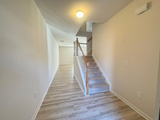 Building Photo - Presenting a Stunning Townhome within the ...