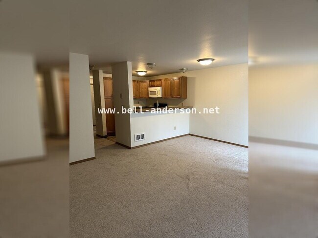 Building Photo - MOVE IN READY- Remodeled 2-bedroom Townhome!