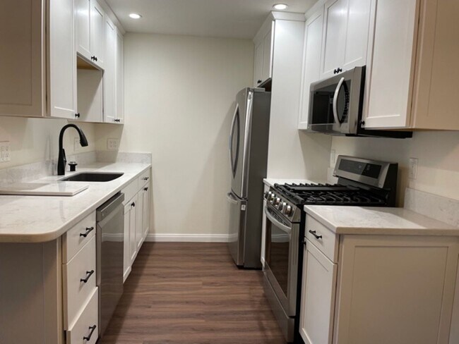 Building Photo - 6600 Warner Ave