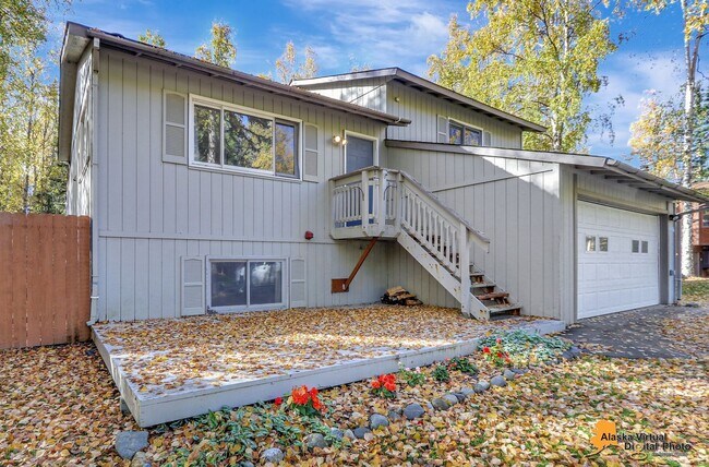 Building Photo - Eagle River Home w/ Fenced Yard, Sunroom, and Garage!