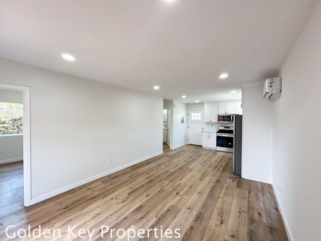 Building Photo - Welcome to your beautifully renovated sing...