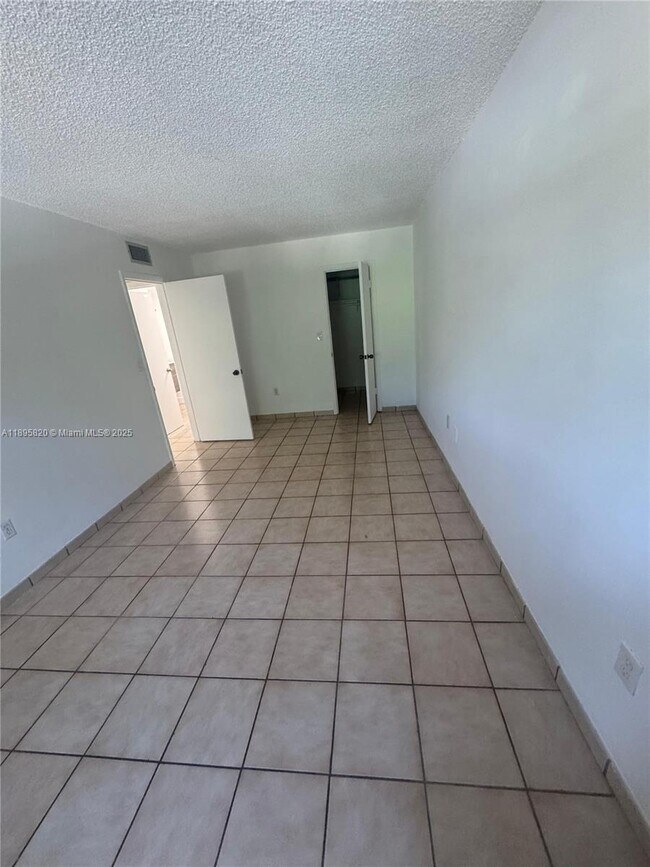 Building Photo - 4265 NW S Tamiami Canal Dr