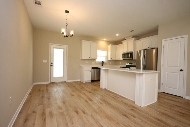 Building Photo - Enjoy Country Living with Modern Comforts!  3BR/2BA Home  with Granite Countertops, Covered Porch...
