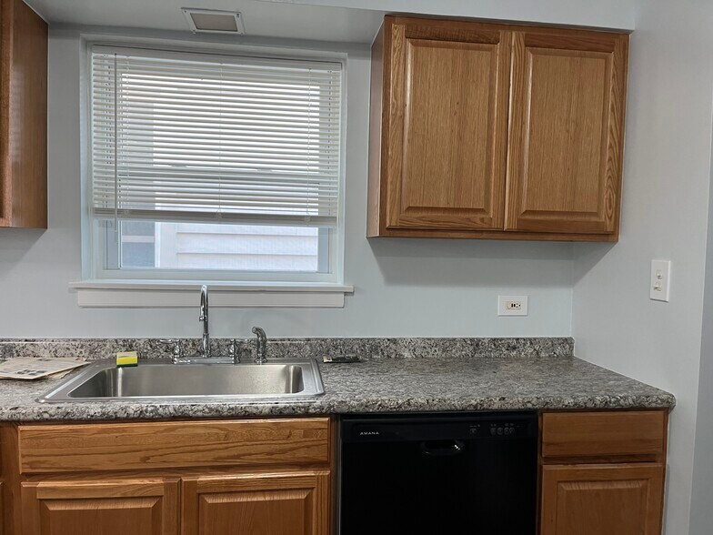 New cabinets and countertop - 728 Dobson St