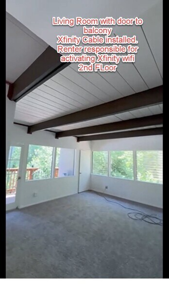 Liiving Room view with Balcony access to Spiral Staircase to Backyard Park-like setting - 6956 Sayre Dr