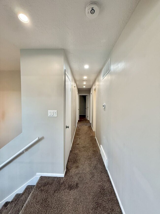 Building Photo - Spacious Comfort Meets Practical Living in...