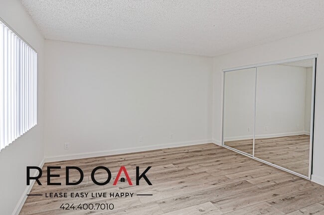 Building Photo - ~1 Month FREE~ Spacious Three Bedroom with...