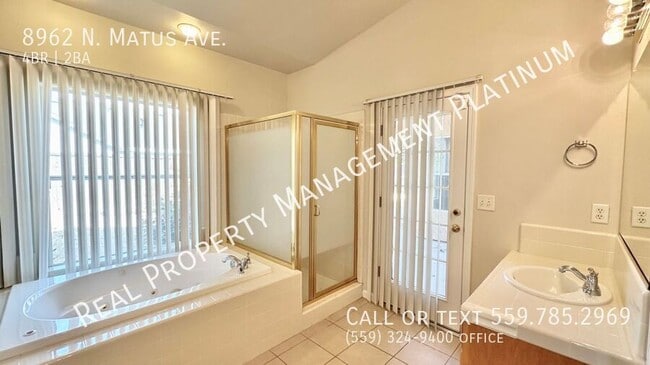 Building Photo - 8962 N Matus Ave