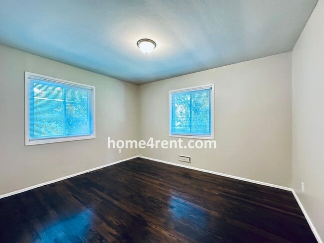 Building Photo - Attractive Prairie Village Ranch w/ FRESH PAINT, Wood Floors, Granite Counters and a Fenced Yard!