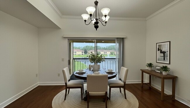 Building Photo - Gated 2 Bed/ 2.5 Bath Condo with 24/7 Security & Monitoring! Screened in Lanai with Water Views!