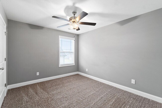 Building Photo - Pet Friendly Three Bedroom with Bonus!