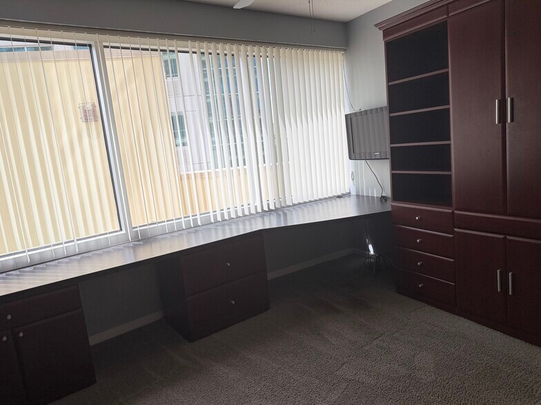Office with tv and builtins - 322 E Central