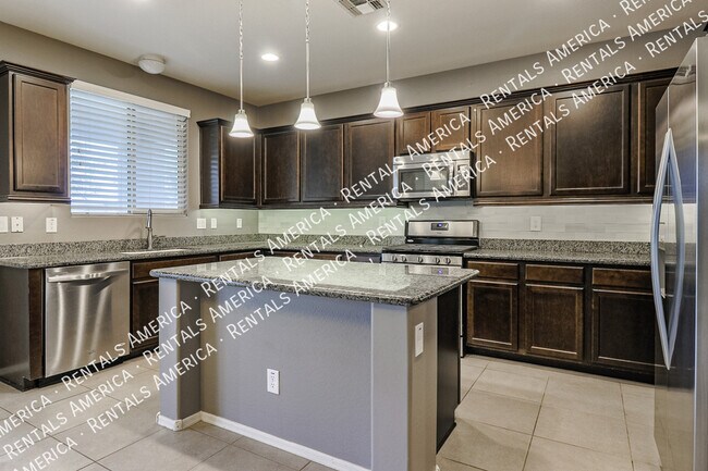 Building Photo - 12114 W Rowel Rd