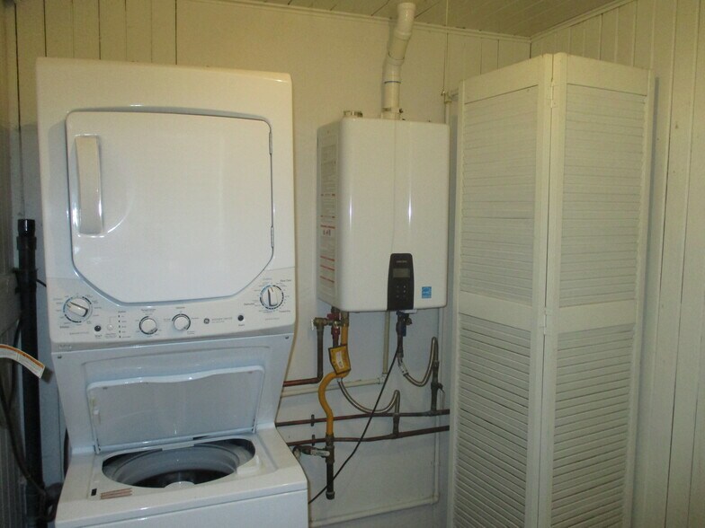 Laundry in unit, on demand hot water tank. - 1730 T St