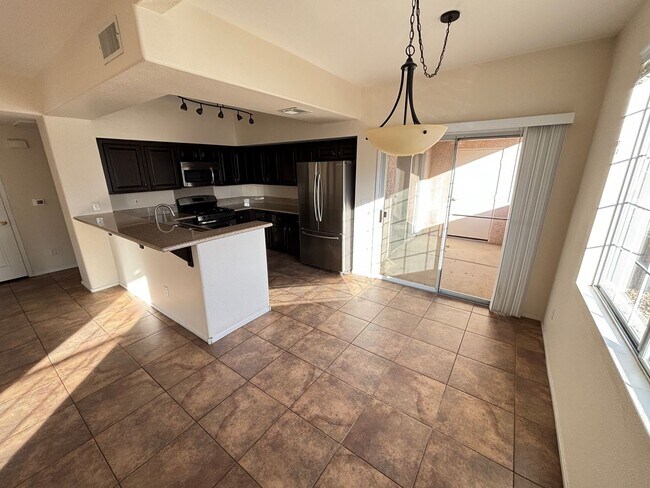 Building Photo - Charming 2Bed/Bath Condo located in a beautiful gated community in the Southwest.