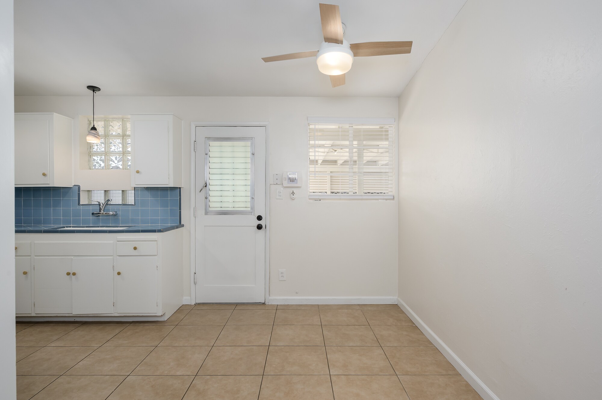 Kitchen, Dining and carport door - 1809 E Colter St