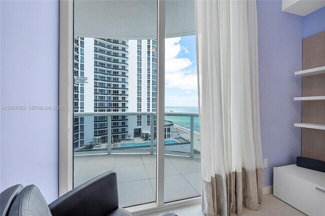 Building Photo - 15811 Collins Ave
