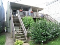 Building Photo - Wood floors, fresh paint, coin laundry, shared yard