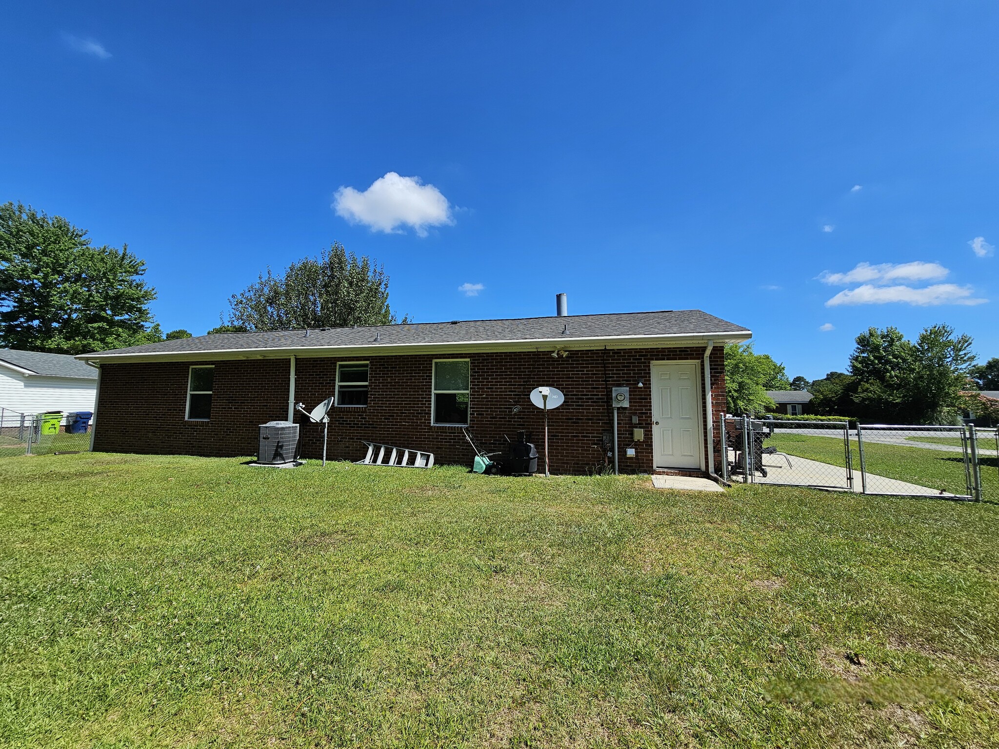 Backyard from trees to house - 419 Rams Rd