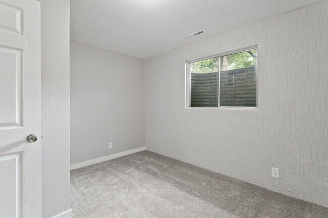 Building Photo - Freshly Renovated 4-Bedroom Home with Over...