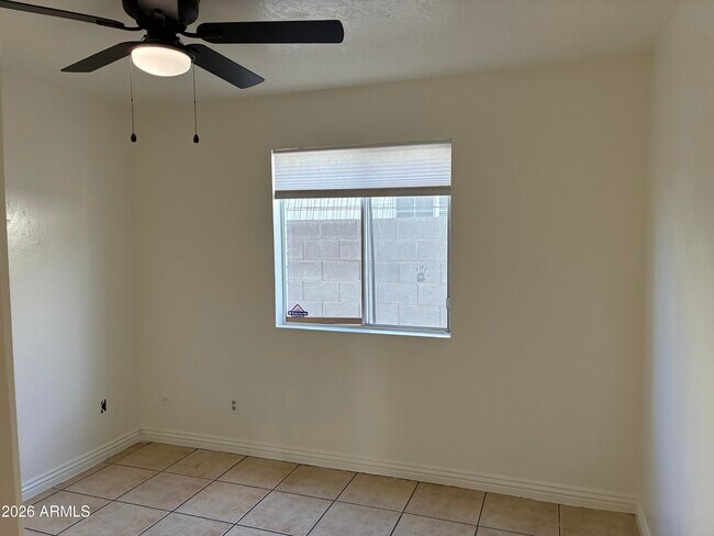 Building Photo - 8819 W Roma Ave