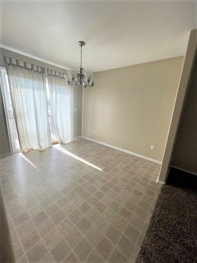 Building Photo - Move-In Ready 5-Bed with Garage, Yard & Up...