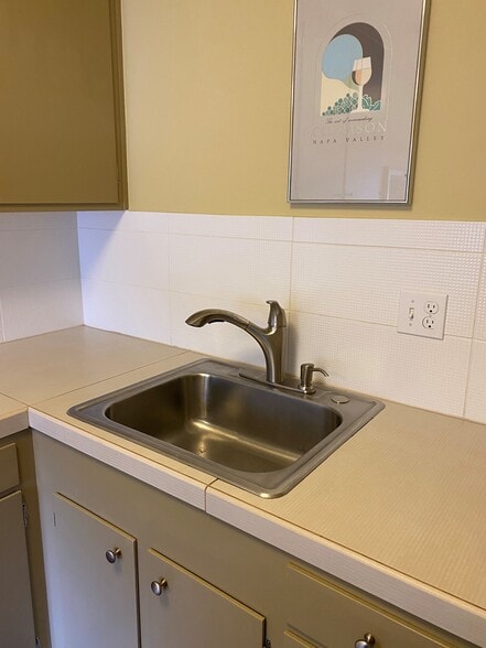Kitchen with Italian tile counters and backsplash - 3833 Maybelle Ave