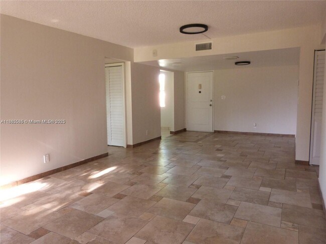 Building Photo - 6751 N University Dr