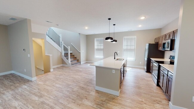 Building Photo - Spacious 3-Bed Carriage House in the Heart of Prairie District