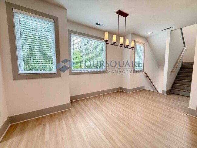 Building Photo - Modern 4-Bed / 4-Bath Townhome with Covered Patio, Deck & Garage – Inside the Beltline Near Downt...
