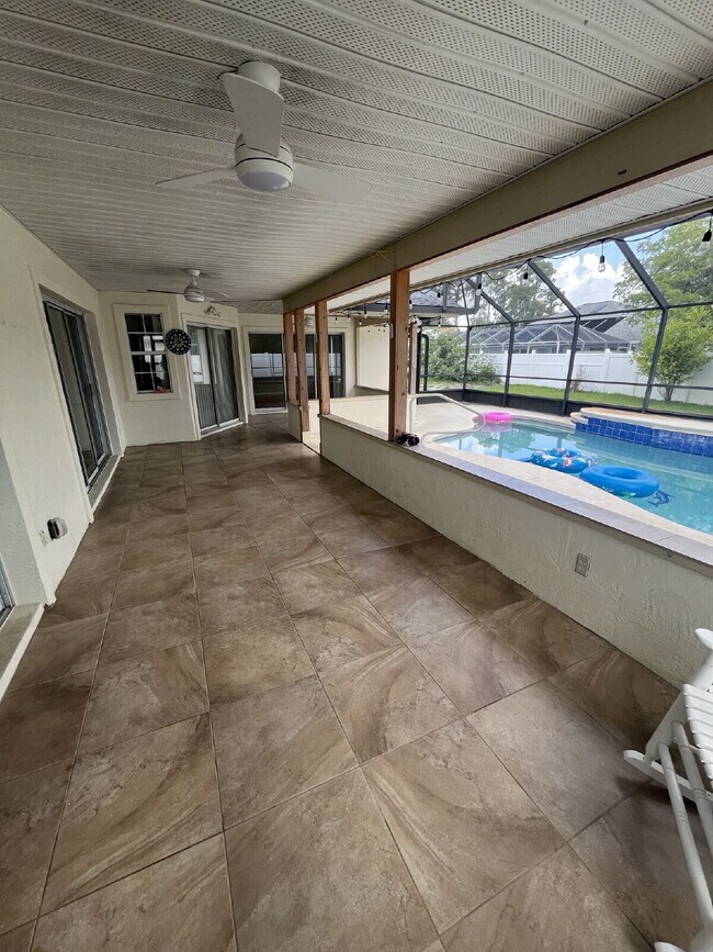 Building Photo - Spacious Pool Home in Desirable Palm Harbor – Pool Care Included