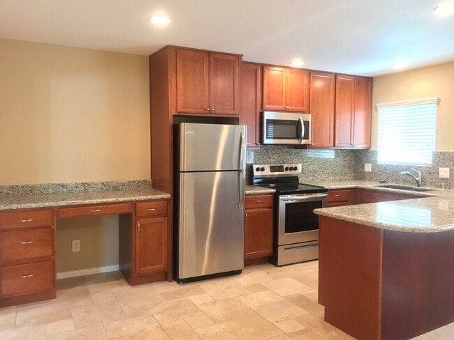 Building Photo - Beautiful and Spacious Apartment in Gated ...