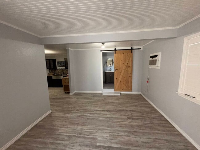 Building Photo - This studio apartment is conveniently located one block from Spohn Shoreline,