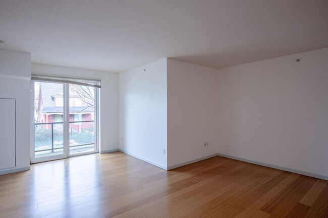 Building Photo - Sweet + secure 1/1 condo with parking, extra storage room + AC available now!